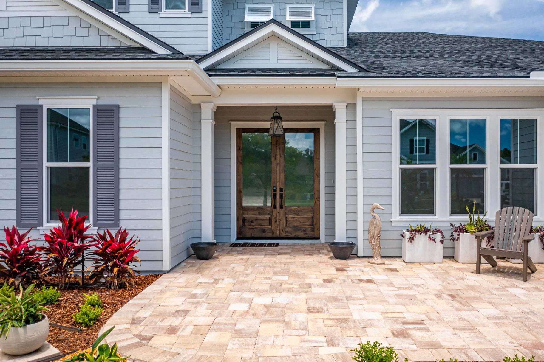 Florida home with new siding, windows, and roofing installed by Weathershield Construction