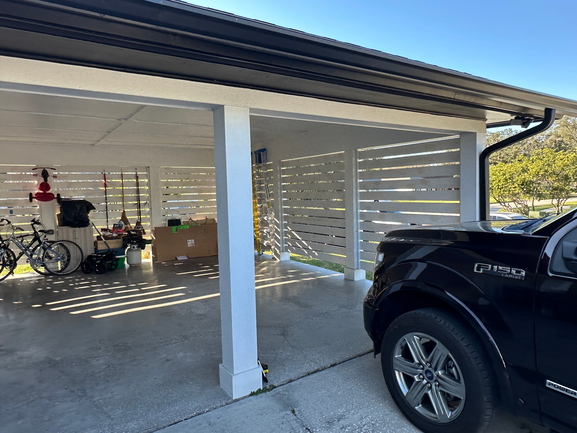 Open carport before renovation in Tampa Bay