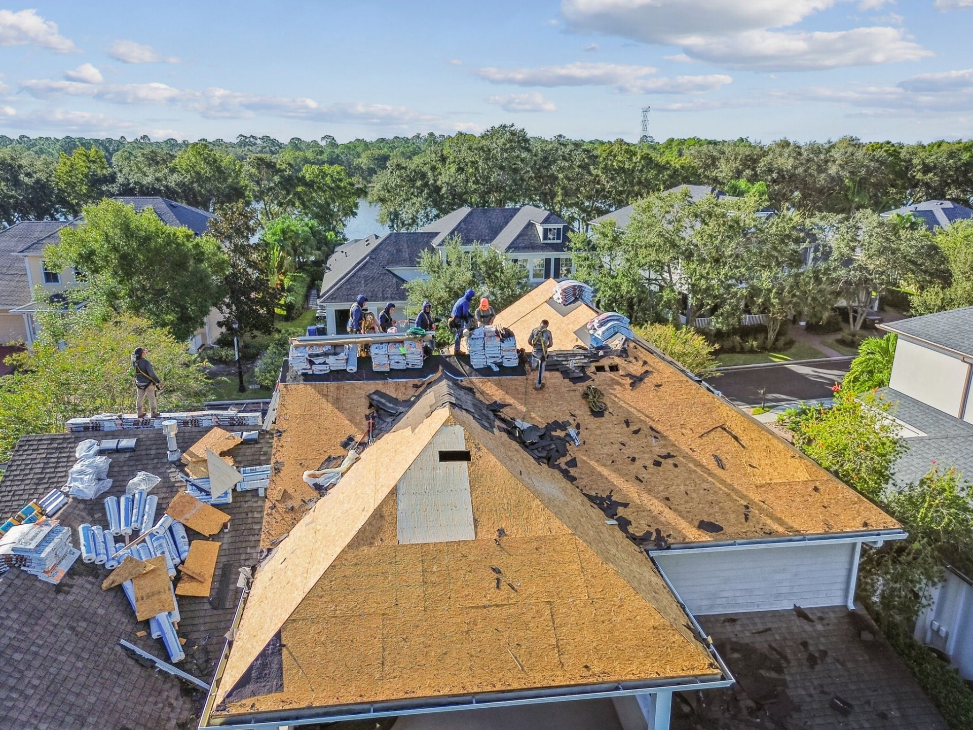 Aerial view of architectural shingle roof installation on a Tampa Bay home